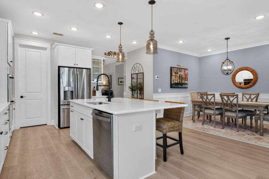 Furnished interior view inside a new home in K. Hovnanian's® Four Seasons at Lakes of Cane Bay, Summerville (Image 39).