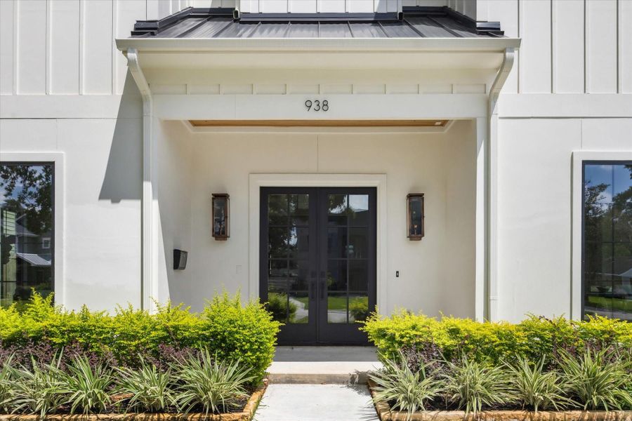 Double French Door entry with covered area. Double French Door entry with covered area.