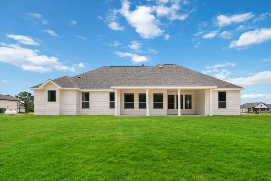 Covered patio offers a peaceful place to unwind—perfect for backyard BBQs or morning coffee. Covered patio offers a peaceful place to unwind—perfect for backyard BBQs or morning coffee.