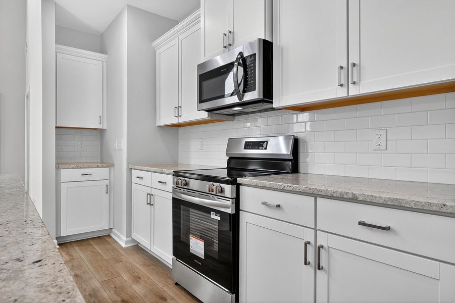 Furnished interior view inside a new home in Grand Park, Leland (Image 8). Furnished interior view inside a new home in Grand Park, Leland (Image 8).