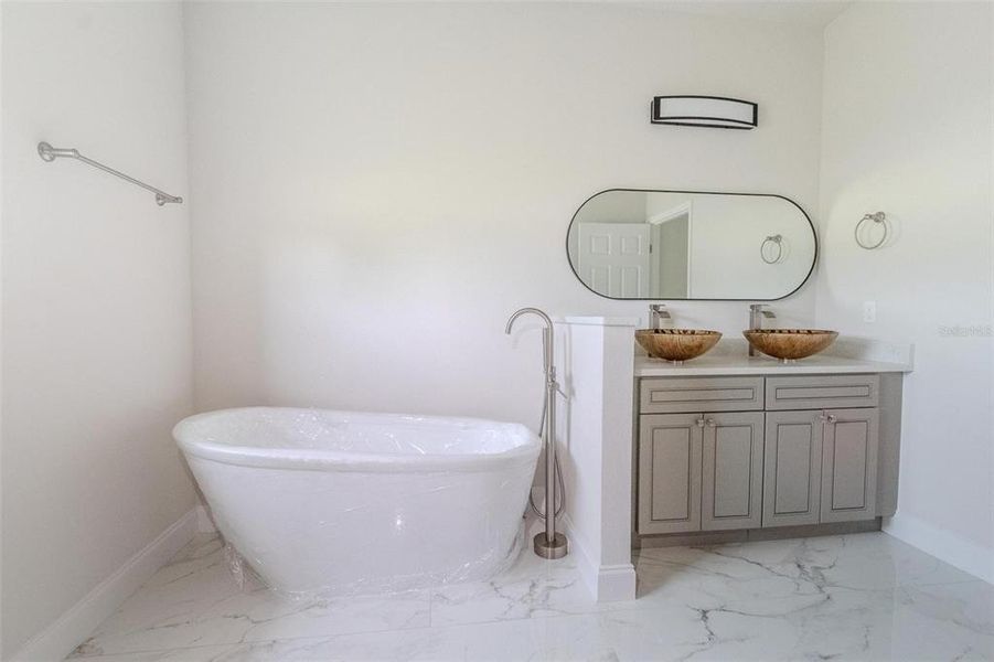 Furnished interior view inside a new home in , Kissimmee (Image 6).