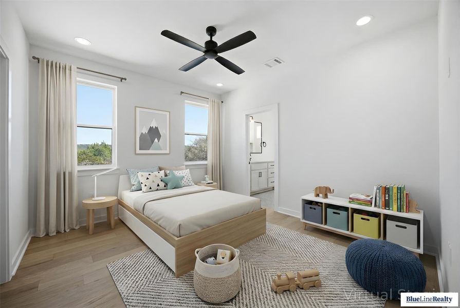 Bedroom with light wood-style flooring, connected bathroom, ceiling fan, and recessed lighting