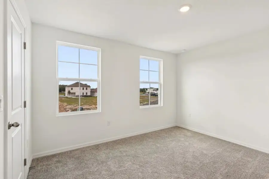 Spacious, unfurnished interior of a new home in Northlake at Ovation, Winter Garden (Image 26).
