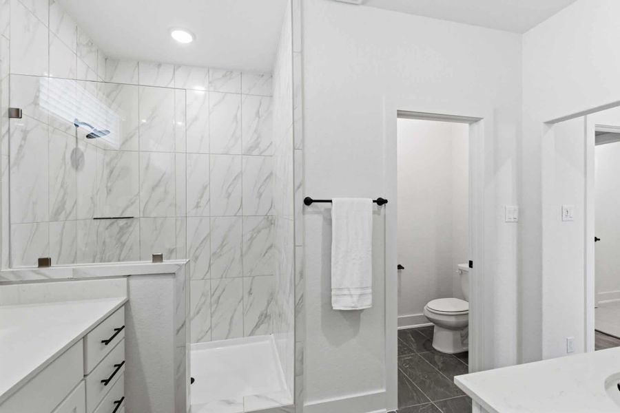 Representative furnished interior of a home built from the Balder by Chesmar Homes in Centero at Stone Oak, San Antonio (Image 10).