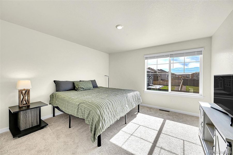 Furnished interior view inside a new home in Settlers Crossing, Commerce City (Image 28).
