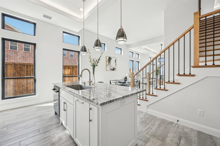 Kitchen island on first floor in open concept plan.