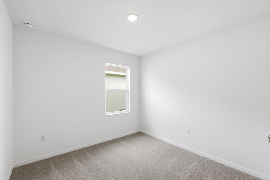 Spacious, unfurnished interior of a new home in Highfield at Twisted Oaks, Wildwood (Image 15).