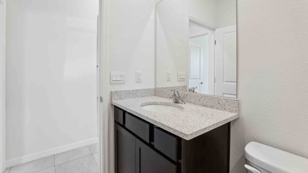 Representative furnished interior of a home built from the Laurel by D.R. Horton in Ocala Preserve, Ocala (Image 15).