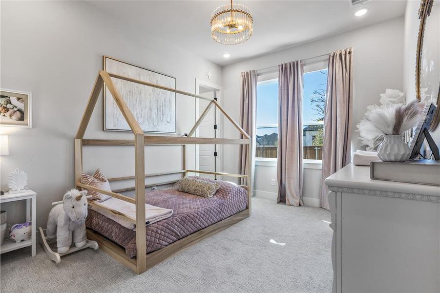 Lovely bedroom with custom lighting and an ensuite bathroom