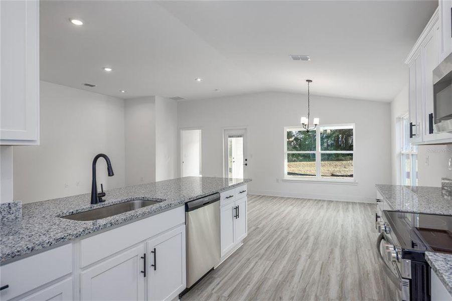 Furnished interior view inside a new home in , Lake City (Image 12).