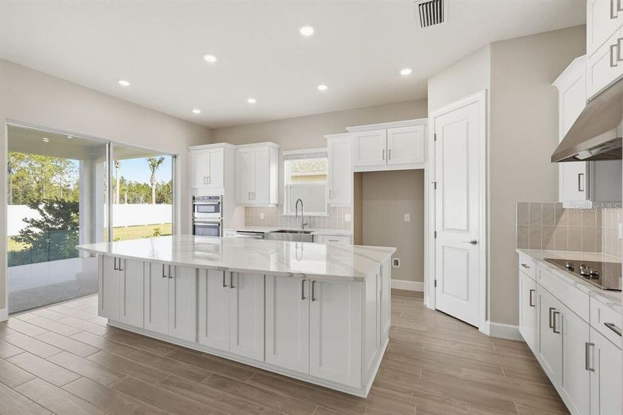 Furnished interior view inside a new home in Esplanade at Westview, Kissimmee (Image 11).