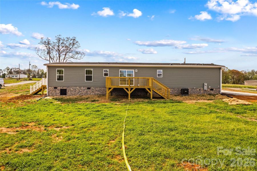 Exterior details and patio area of a home in , Hamptonville (Image 18).
