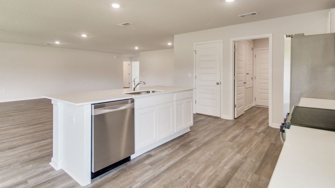 Furnished interior view inside a new home in The Enclave at Bar W Ranch, Baker (Image 5).