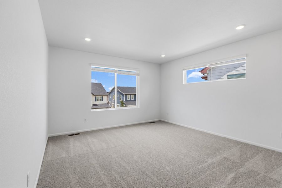 Spacious, unfurnished interior of a new home in Woodrose at Painted Prairie, Aurora (Image 14).