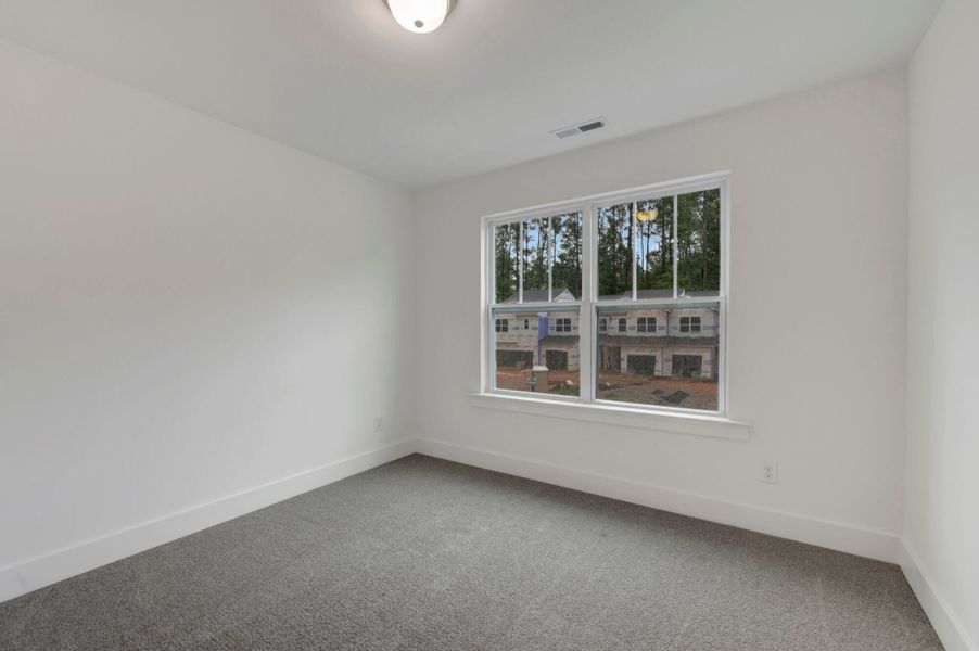 Spacious, unfurnished interior of a new home in Ashmore Townes, Garner (Image 27). Spacious, unfurnished interior of a new home in Ashmore Townes, Garner (Image 27).
