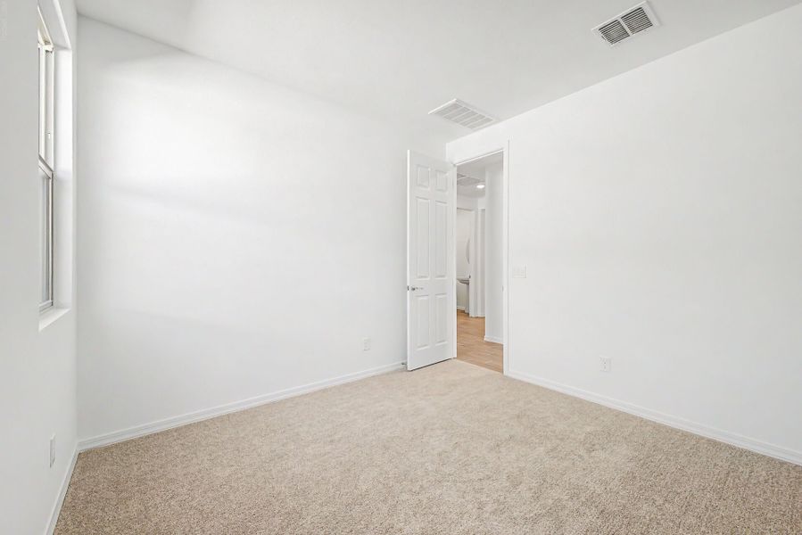 Spacious, unfurnished interior of a new home in White Tank Vistas, Waddell (Image 13). Spacious, unfurnished interior of a new home in White Tank Vistas, Waddell (Image 13).