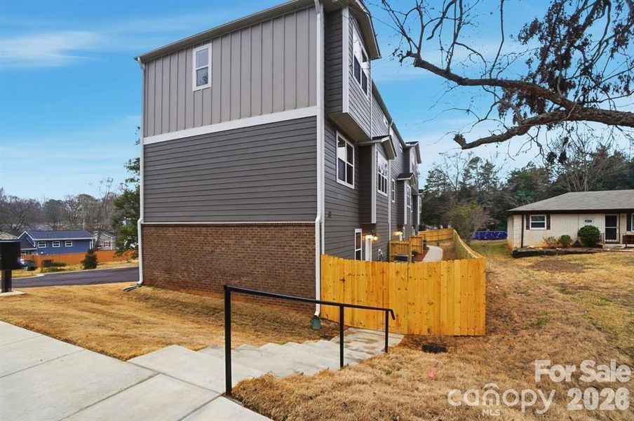 Exterior details and patio area of a home in , Charlotte (Image 27). Exterior details and patio area of a home in , Charlotte (Image 27).