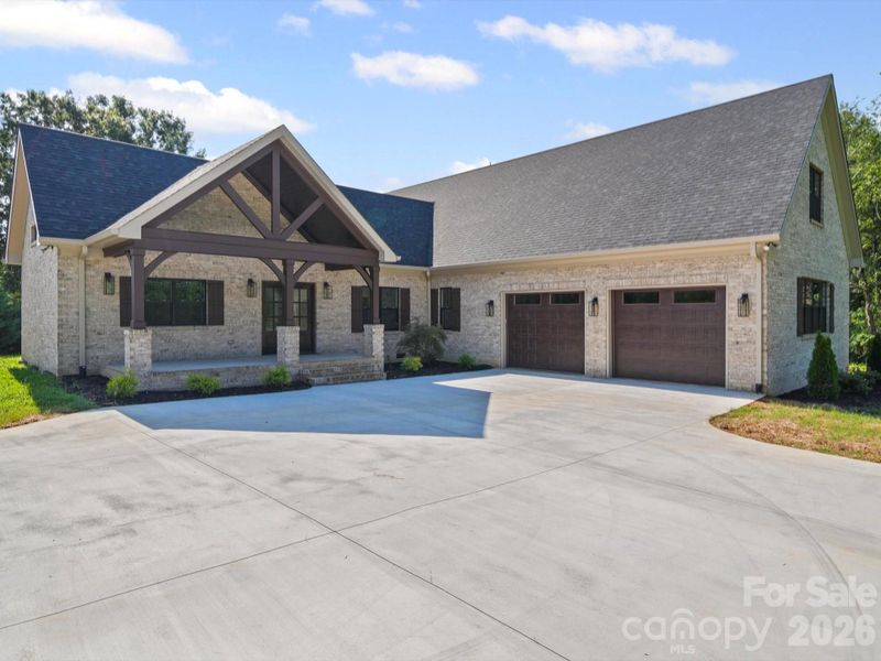 Front exterior of a new home in , Indian Trail, NC, highlighting curb appeal (Image 26). Front exterior of a new home in , Indian Trail, NC, highlighting curb appeal (Image 26).