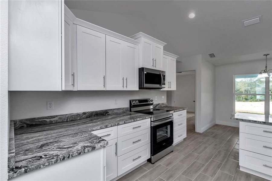 Furnished interior view inside a new home in , Ocala (Image 9).