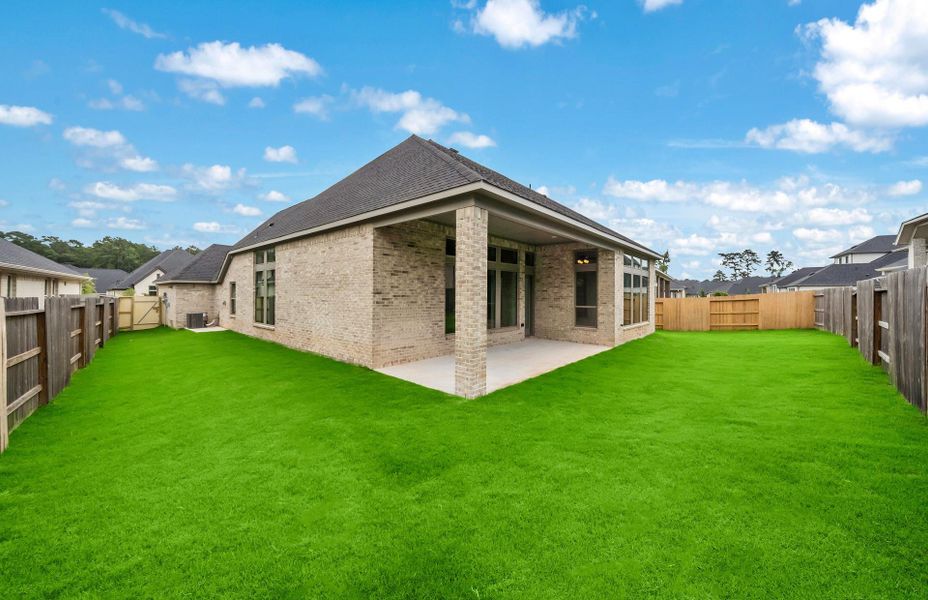 Exterior details and patio area of a home in Audubon 60′, Magnolia (Image 4).