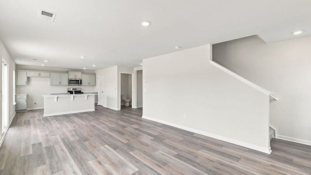 Spacious, unfurnished interior of a new home in Bentley Park, Greenwood (Image 19).