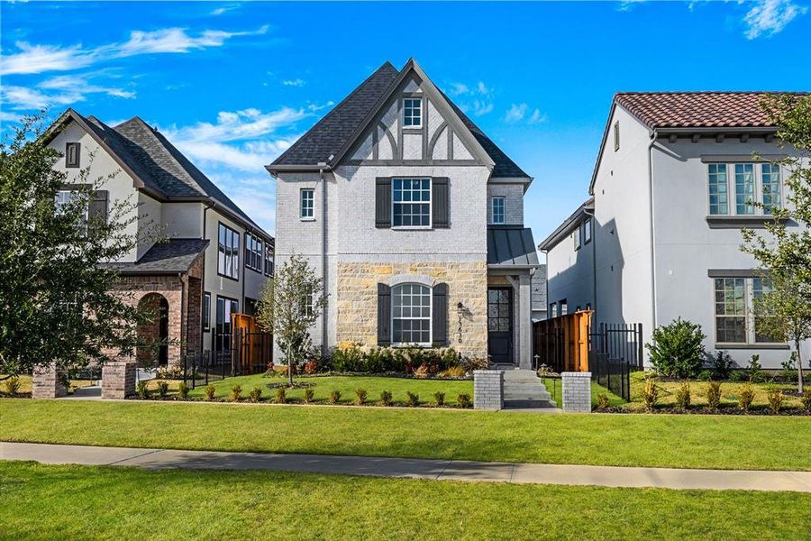 Front exterior of a new home in Fields Villas - Darling Homes, Frisco, TX, highlighting curb appeal (Image 1). Front exterior of a new home in Fields Villas - Darling Homes, Frisco, TX, highlighting curb appeal (Image 1).