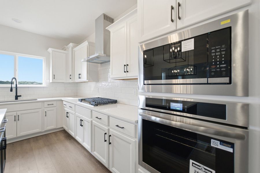 Furnished interior view inside a new home in McCain's Station, Gallatin (Image 11).