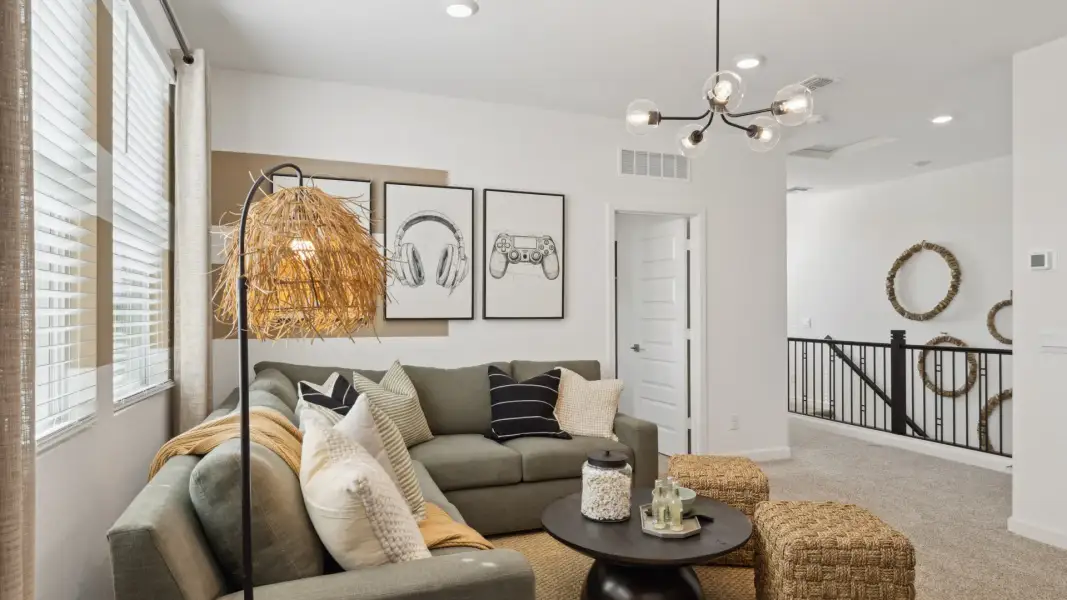 Representative furnished interior of a home built from the Ibis by D.R. Horton in Citrus Pointe, Phoenix (Image 28).