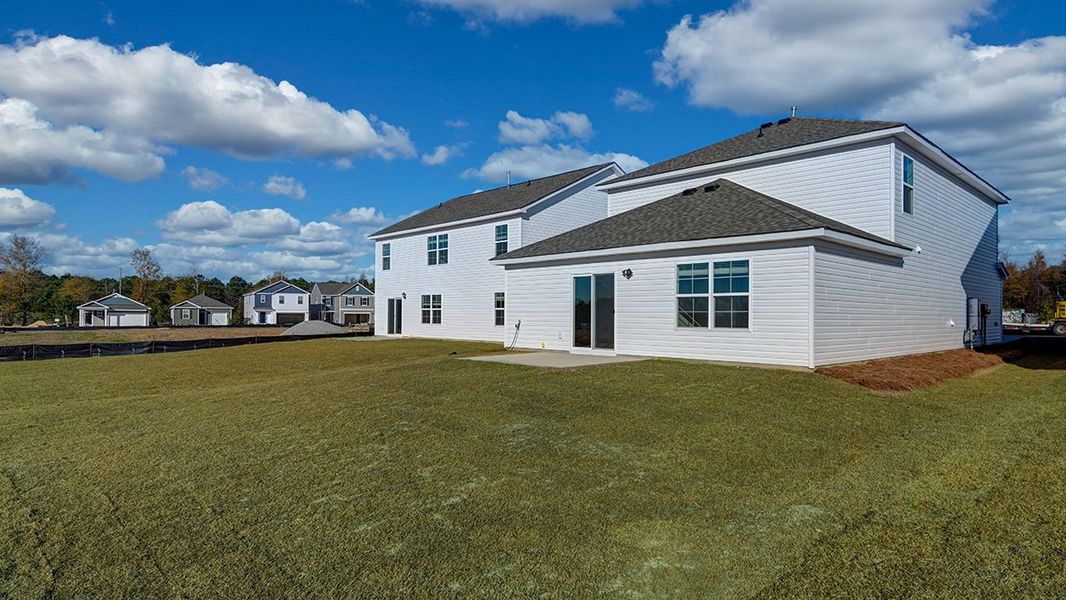Exterior details and patio area of a home in Hunter's Branch, Hopkins (Image 22).