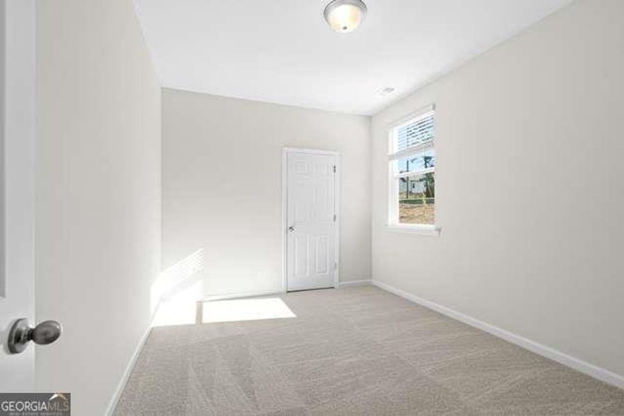 Spacious, unfurnished interior of a new home in Wehunt Meadows, Hoschton (Image 14).
