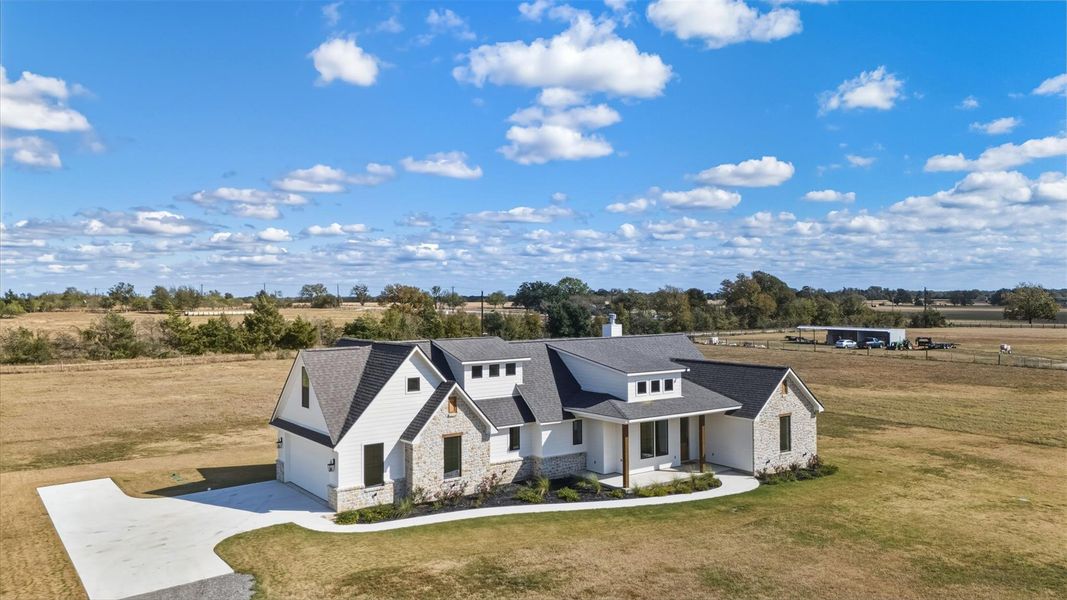Front exterior of a new home in , Franklin, TX, highlighting curb appeal (Image 29). Front exterior of a new home in , Franklin, TX, highlighting curb appeal (Image 29).