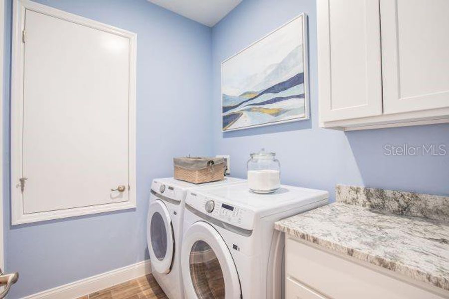 Furnished interior view inside a new home in Heritage Station, Punta Gorda (Image 25).