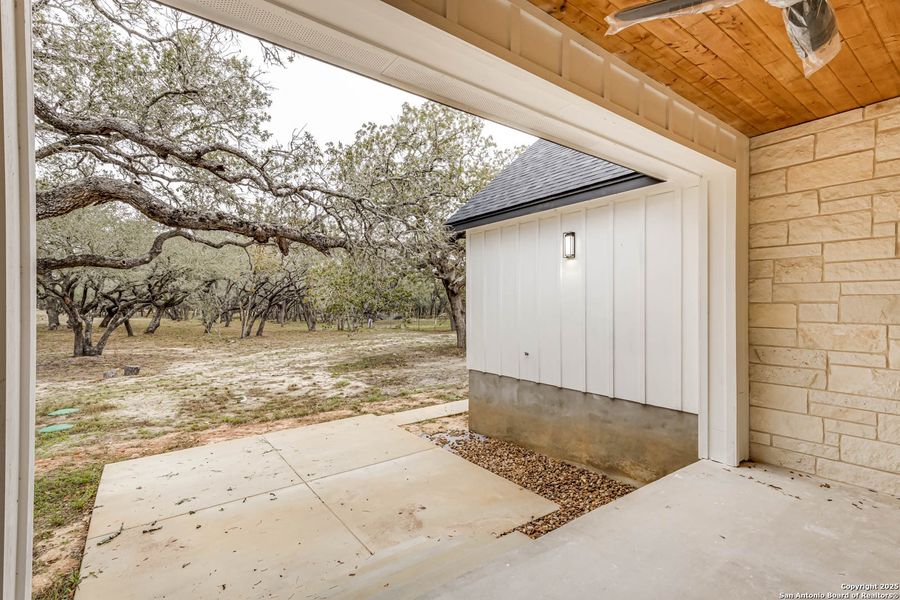 Exterior details and patio area of a home in , Floresville (Image 3).