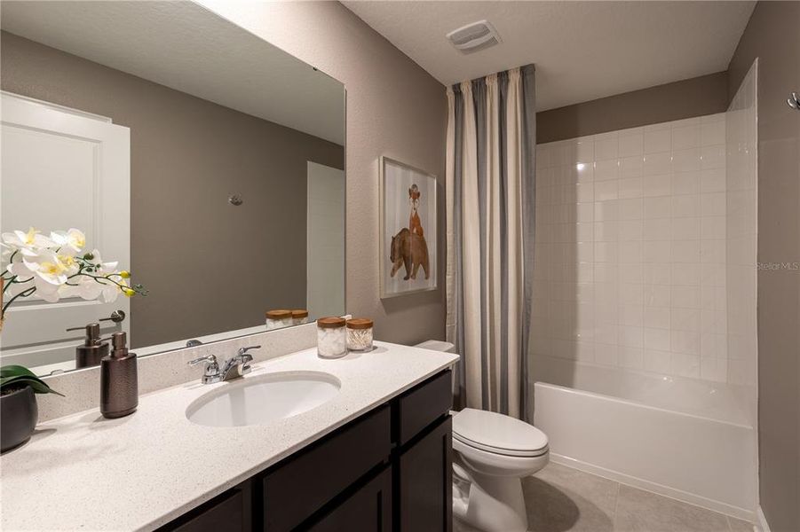 Furnished interior view inside a new home in Knightsbridge, Kissimmee (Image 9). Furnished interior view inside a new home in Knightsbridge, Kissimmee (Image 9).