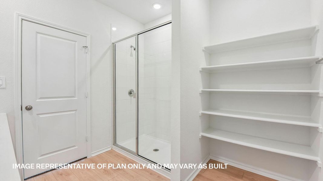 Representative furnished interior of a home built from the The Travis by D.R. Horton in Valverde, Bastrop (Image 12).