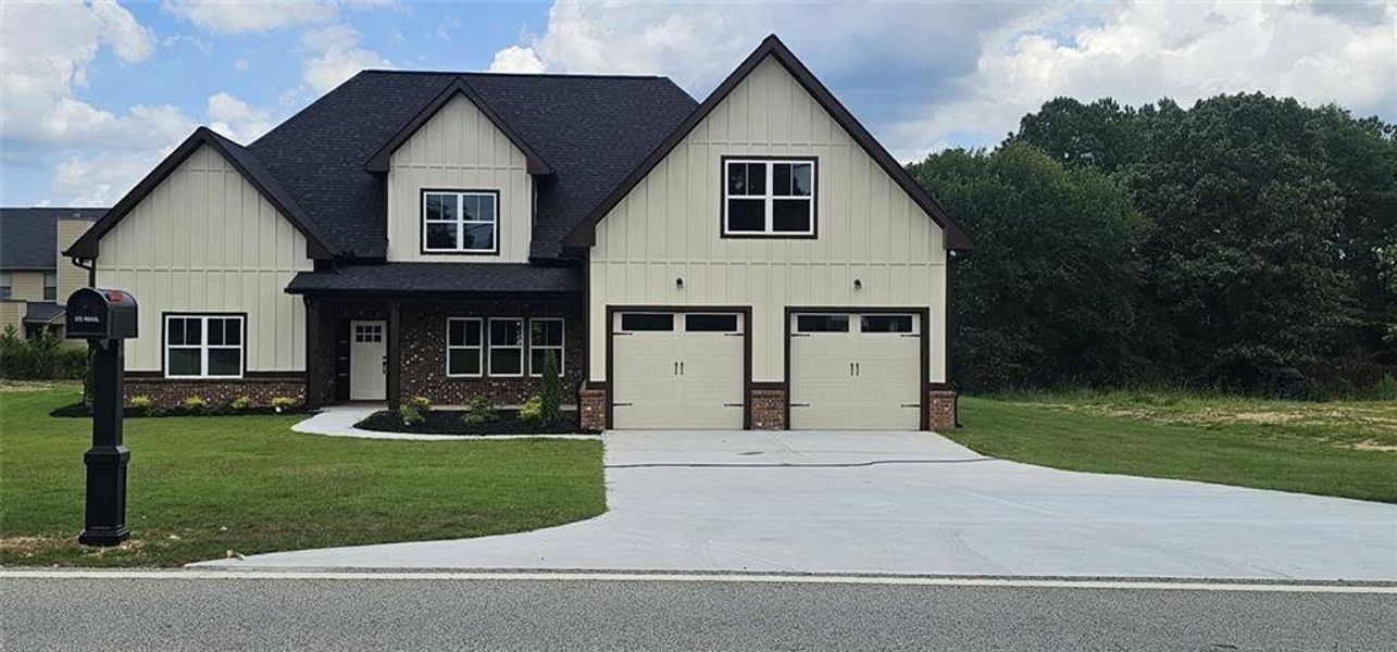 Front exterior of a new home in , Loganville, GA, highlighting curb appeal (Image 22). Front exterior of a new home in , Loganville, GA, highlighting curb appeal (Image 22).