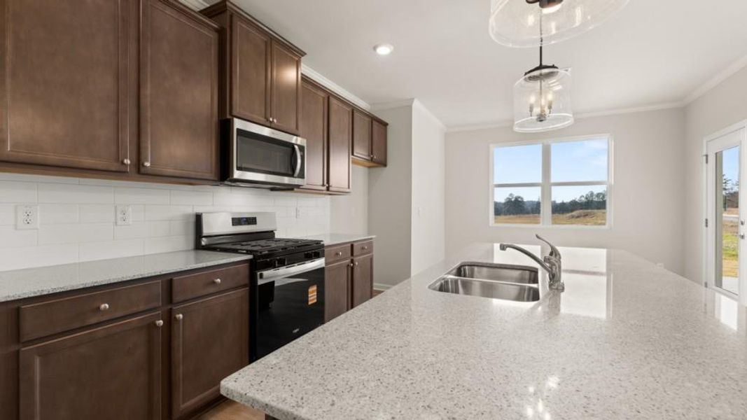 Furnished interior view inside a new home in Fairway 17 at Mirror Lake, Villa Rica (Image 7).