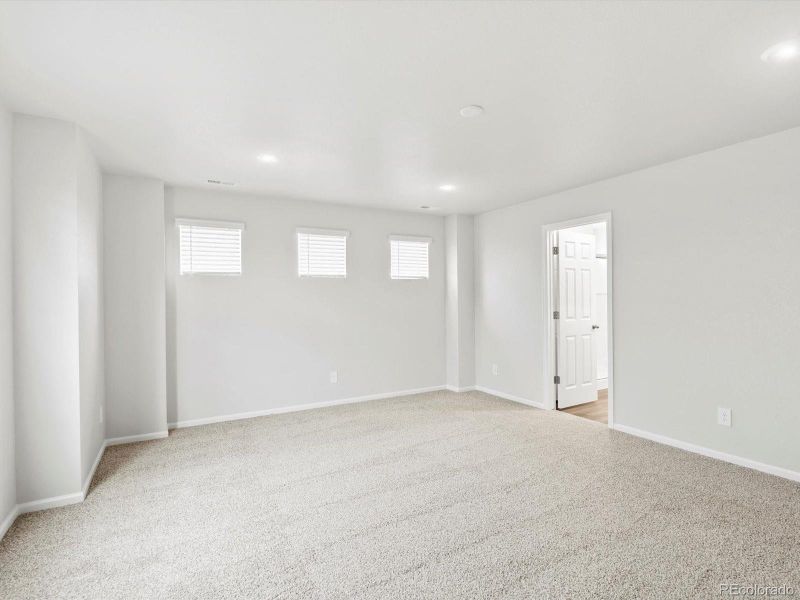 Spacious, unfurnished interior of a new home in Buffalo Highlands: The Flora Collection, Commerce City (Image 16).