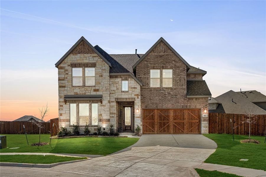 Front exterior of a new home in The Oaks, Red Oak, TX, highlighting curb appeal (Image 20).