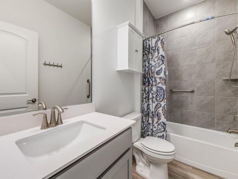 Furnished interior view inside a new home in Woodcreek, Fate (Image 11).