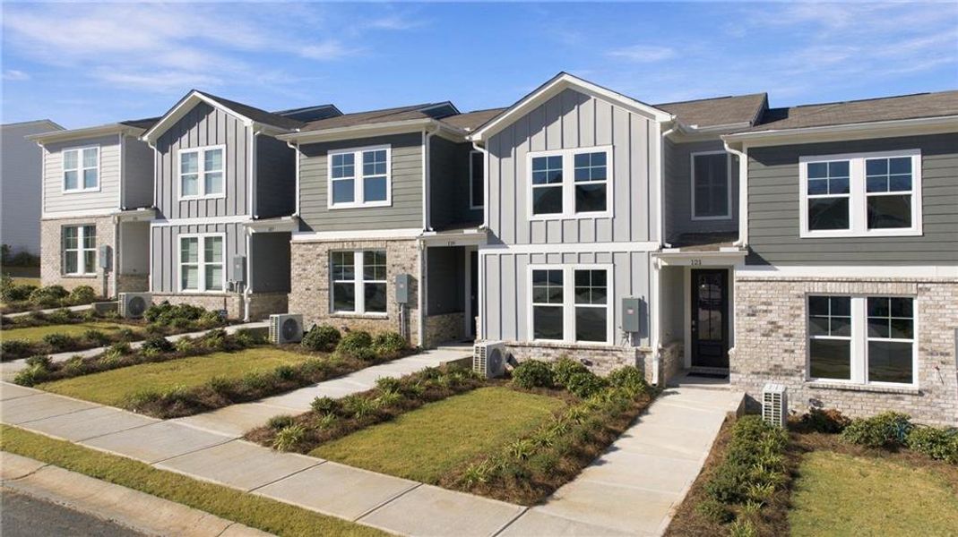 Front exterior of a new home in Stegall Village, Emerson, GA, highlighting curb appeal (Image 18).