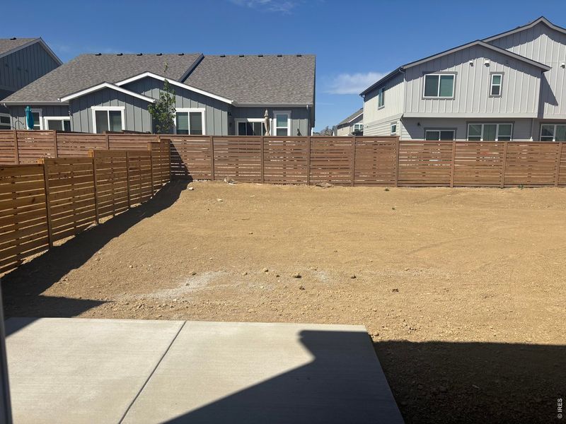 Exterior details and patio area of a home in Wilson Commons, Loveland (Image 3).