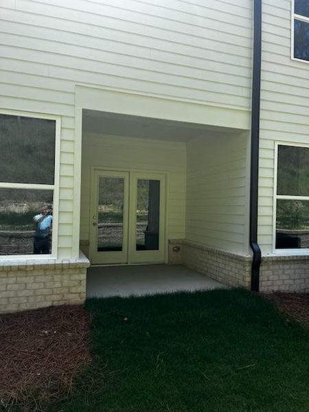 Front exterior of a new home in Riversong, Duluth, GA, highlighting curb appeal (Image 19).