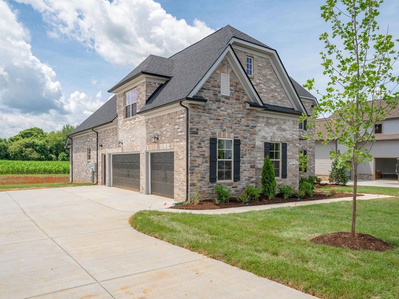 Representative exterior photo of a completed home built from the The Hawkins by Davidson Homes LLC in Shelton Square, Murfreesboro, TN (Image 20). Representative exterior photo of a completed home built from the The Hawkins by Davidson Homes LLC in Shelton Square, Murfreesboro, TN (Image 20).