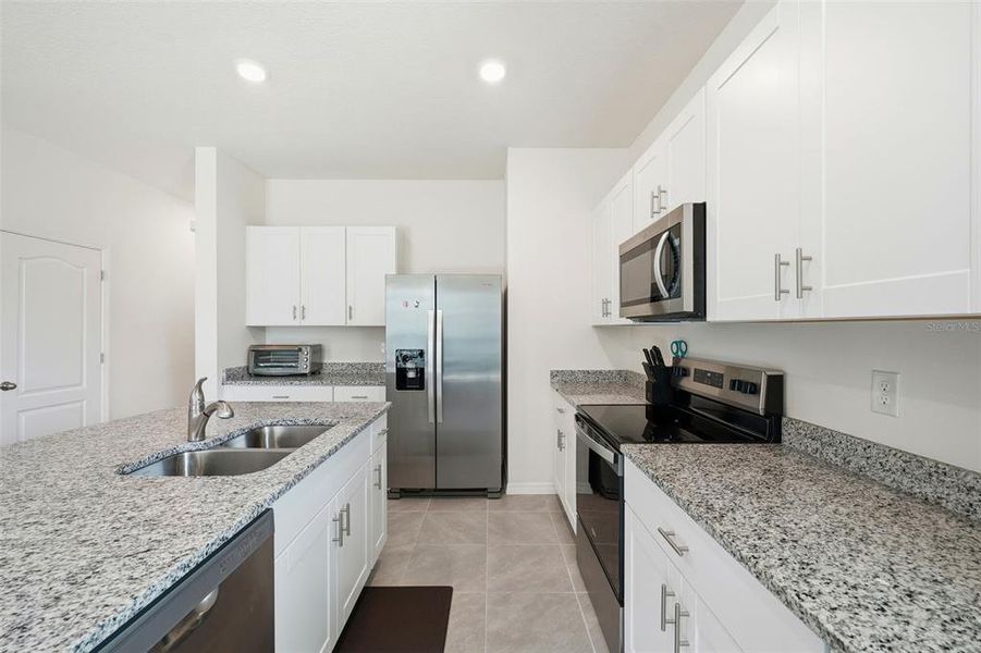 Furnished interior view inside a new home in , Kissimmee (Image 11).