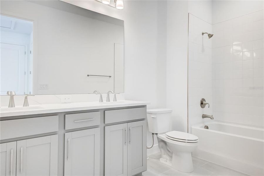 Furnished interior view inside a new home in Bungalow Walk at Lakewood Ranch, Sarasota (Image 11).