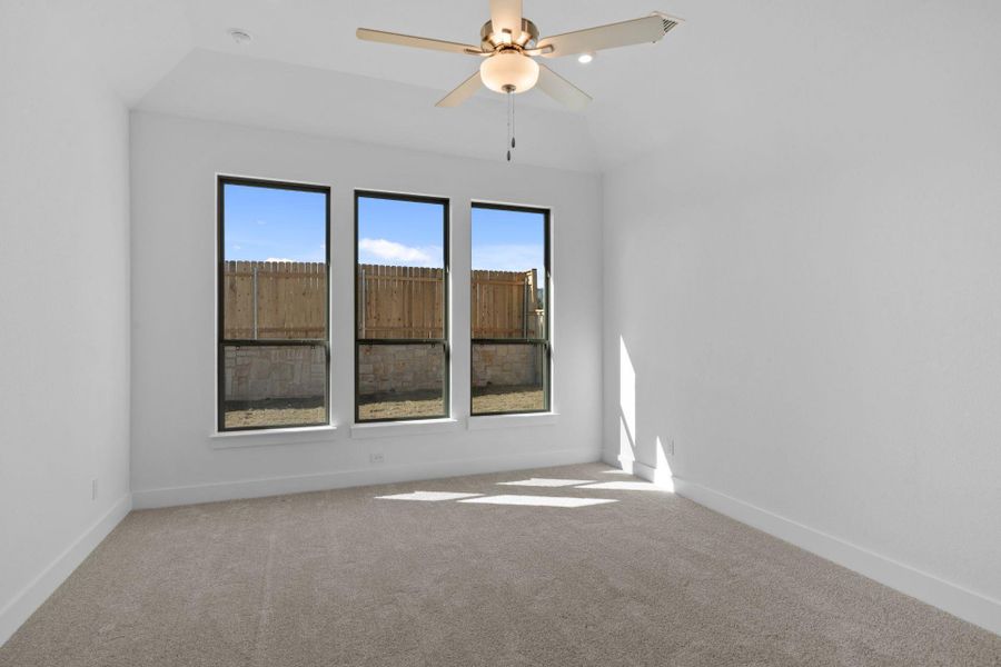Primary Bedroom with elevated ceiling