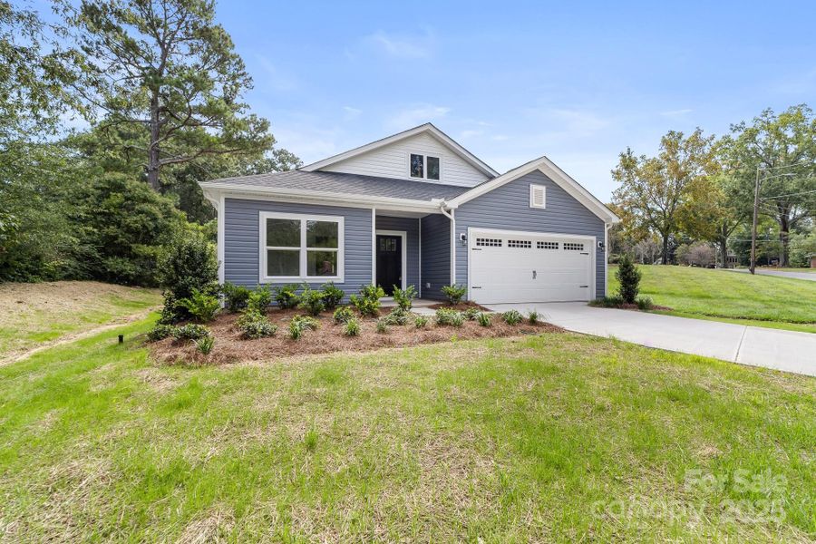 Front exterior of a new home in , Cherryville, NC, highlighting curb appeal (Image 1). Front exterior of a new home in , Cherryville, NC, highlighting curb appeal (Image 1).