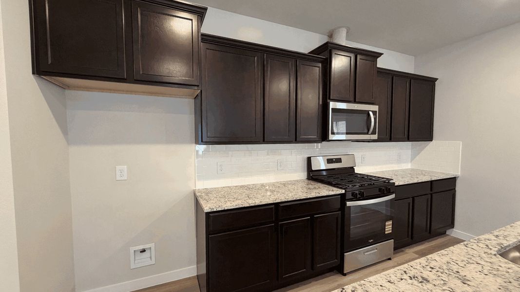 Furnished interior view inside a new home in Royal Oak South, Corpus Christi (Image 3).