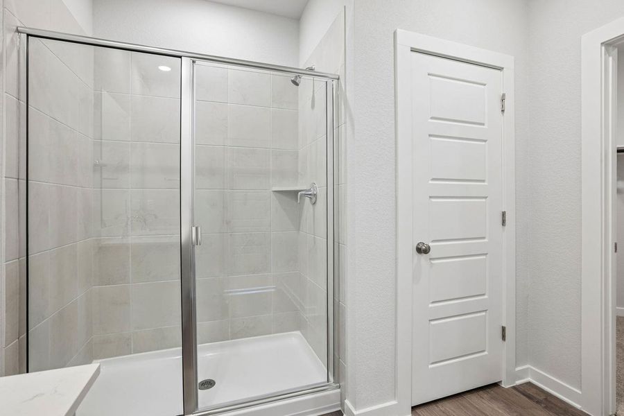 Furnished interior view inside a new home in Stallion Run, Buda (Image 10).